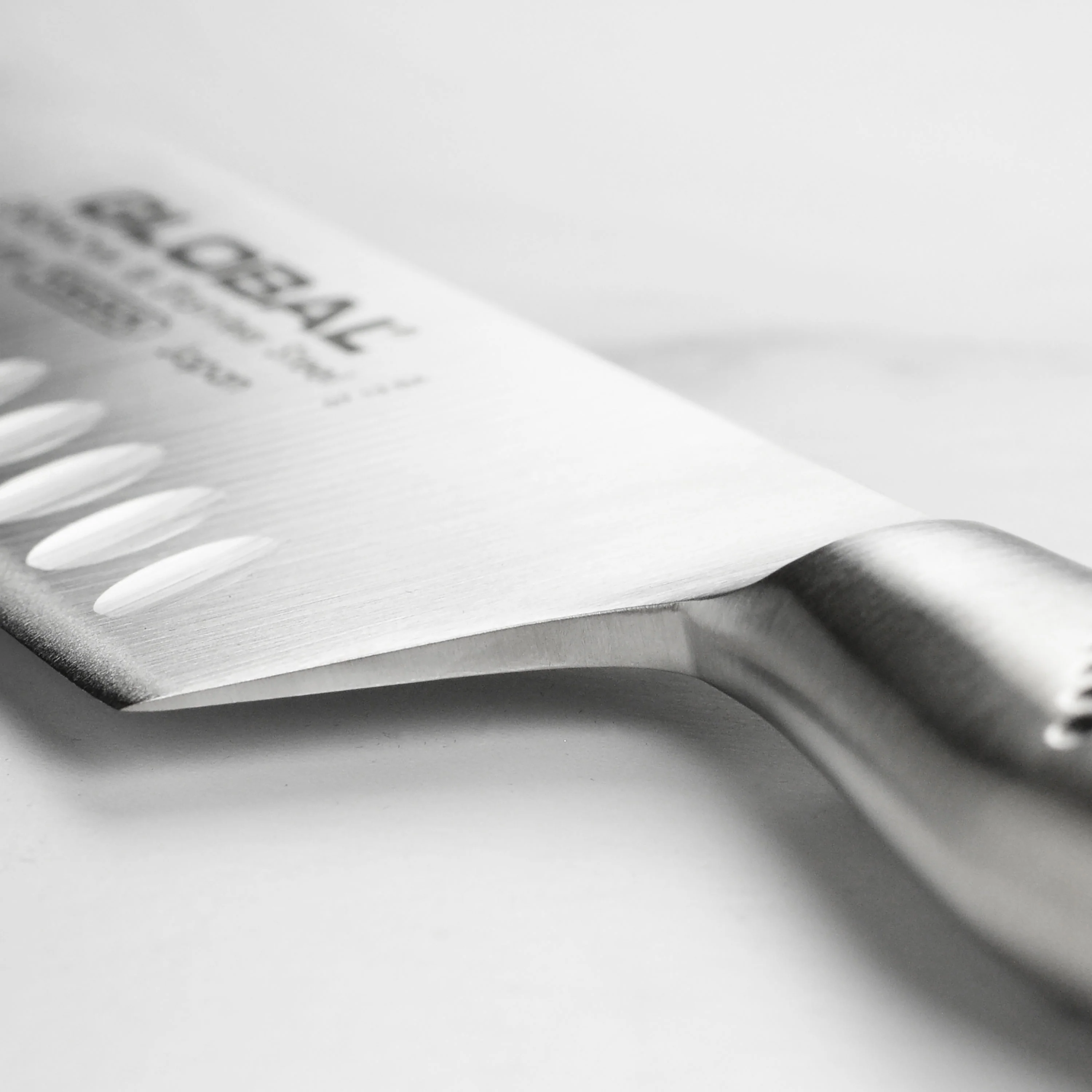 Global Model X 8" Hollow Edge Chef's Knife - Image 7