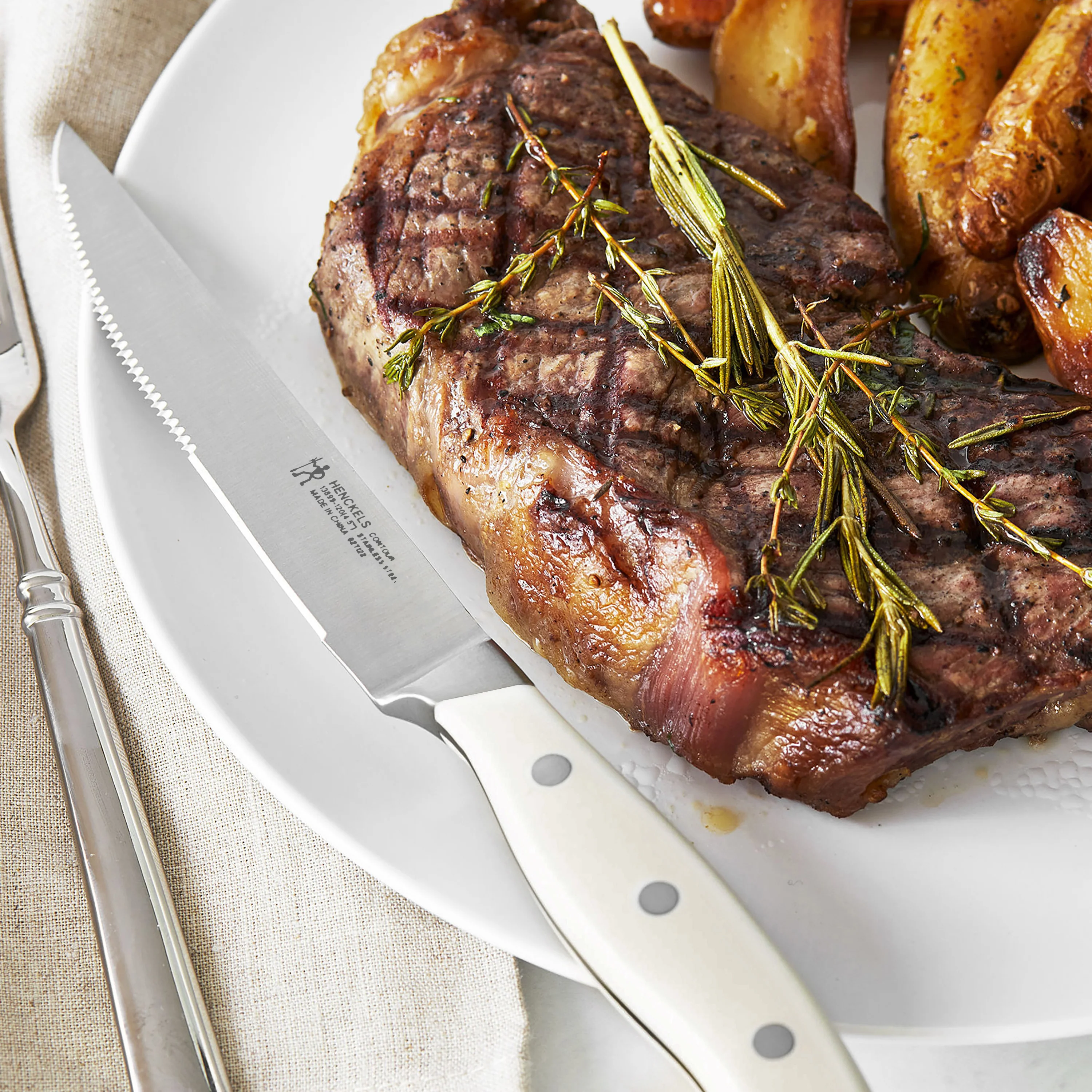 Henckels 8 Piece Forged Serrated Steak Knife Set with Gift Box, Off-White Handles - Image 4