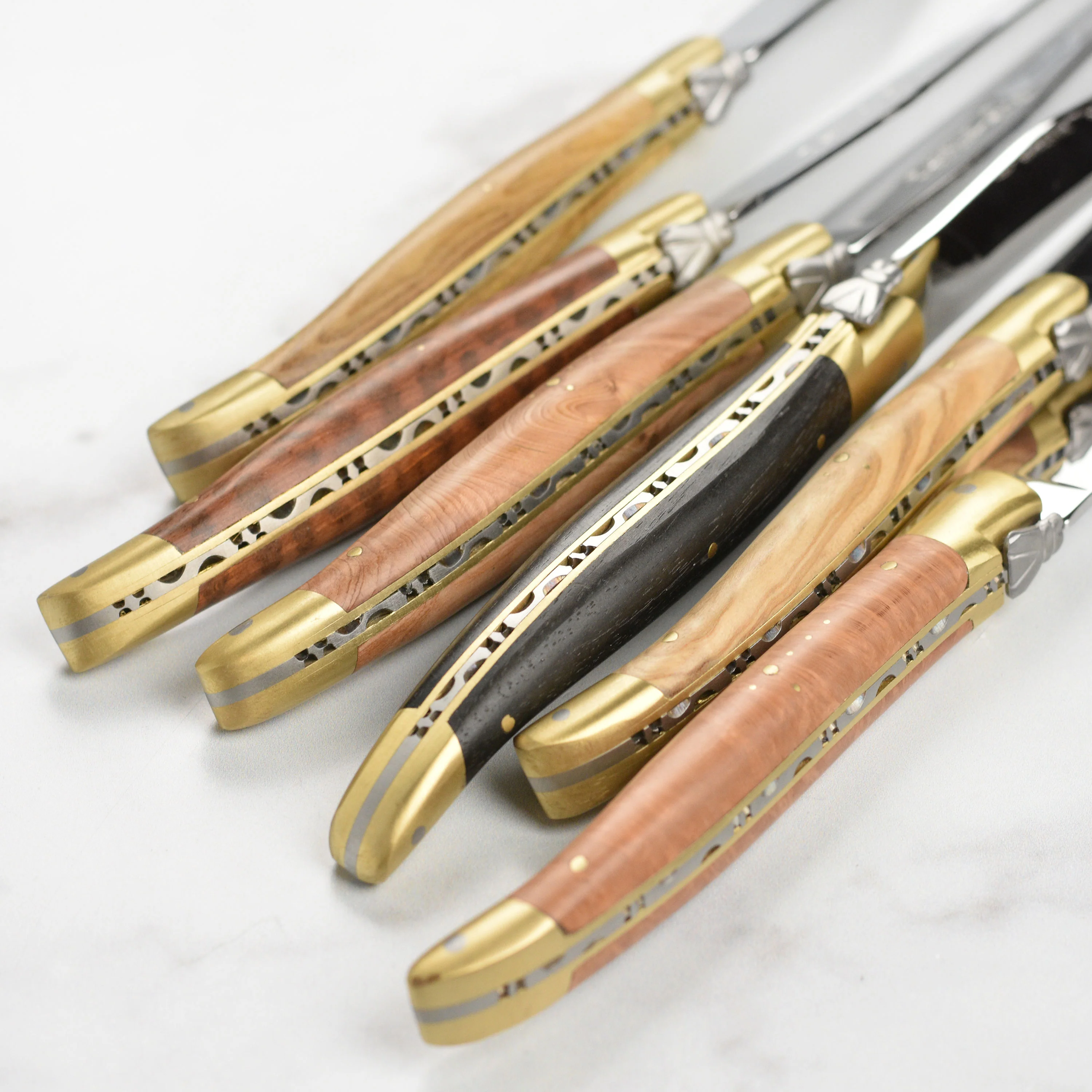 Laguiole en Aubrac 6 Piece Steak Knife Set with Burl Mixed Wood Handles & Brass Bolsters - Image 5