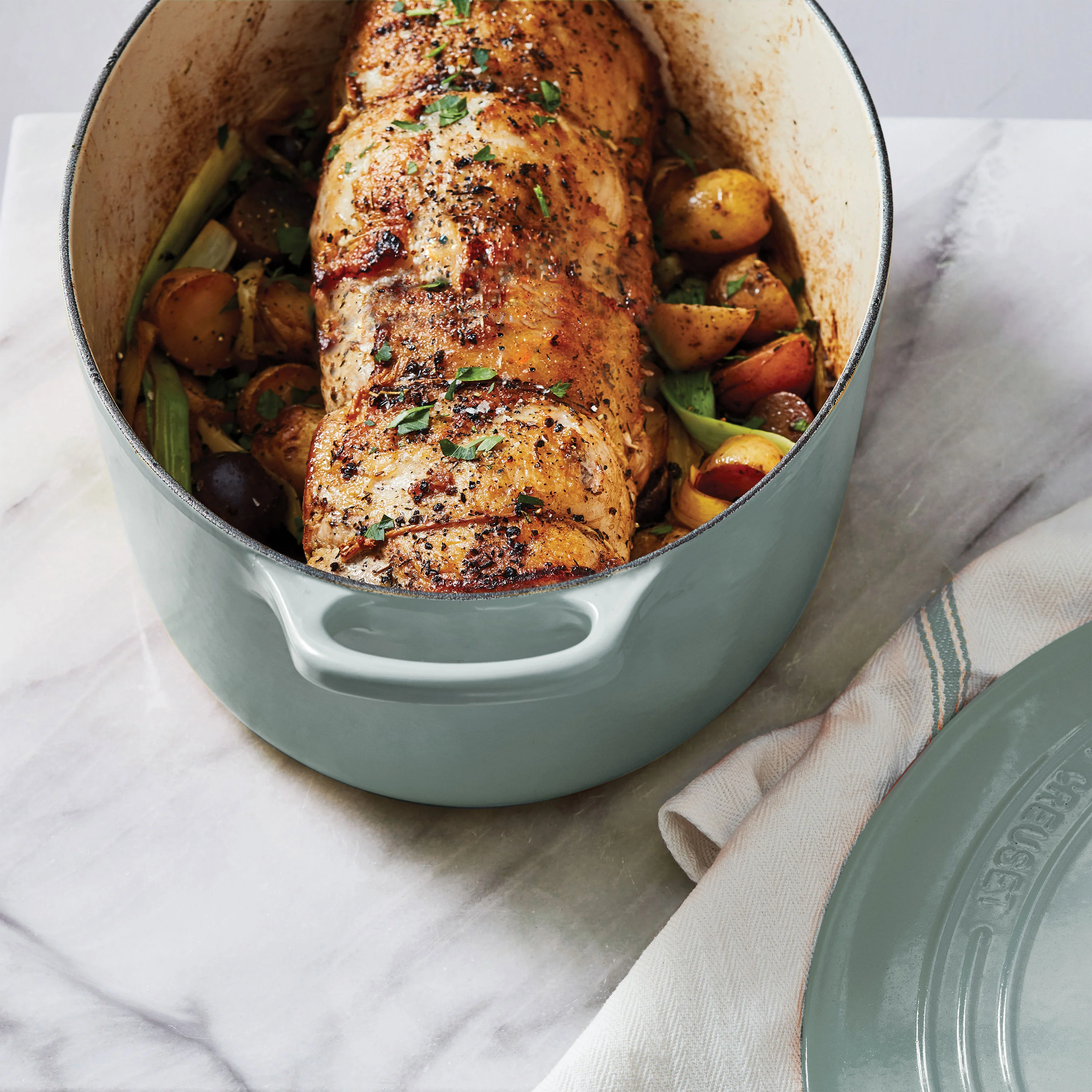 Le Creuset Signature Cast Iron 8-quart Sea Salt Oval Dutch Oven with Copper Knob - Image 2
