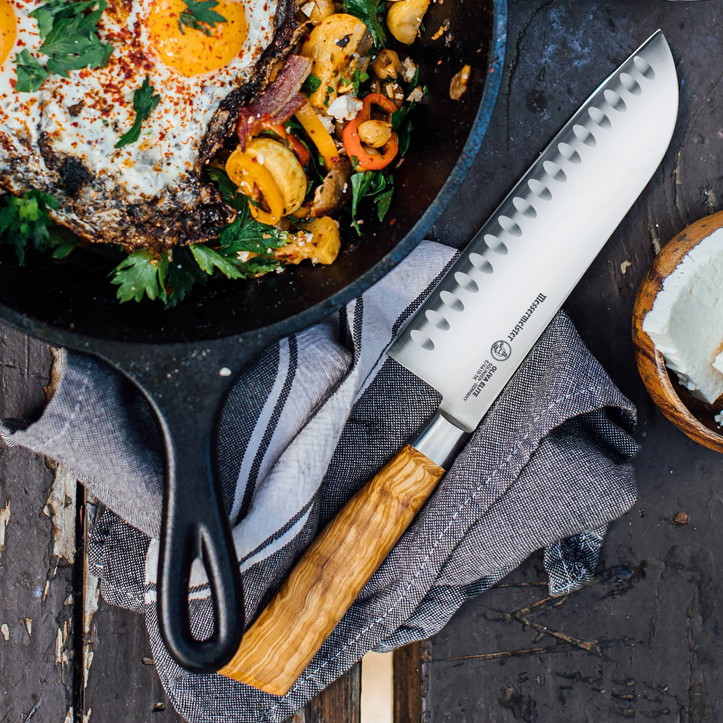 Messermeister Oliva Elite 7" Hollow Edge Santoku Knife - Image 5