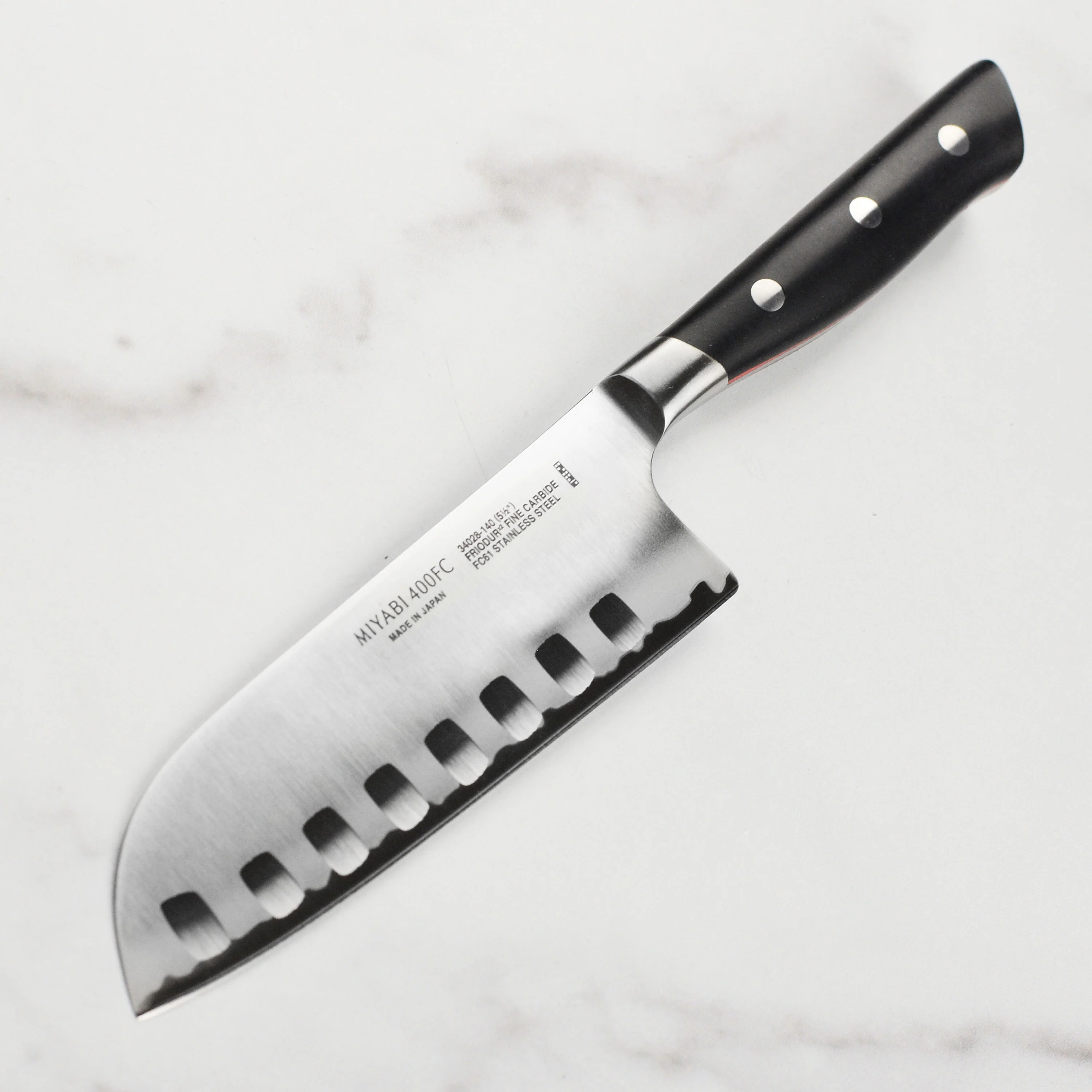 Miyabi Evolution 5.5" Hollow Edge Santoku Knife - Image 5