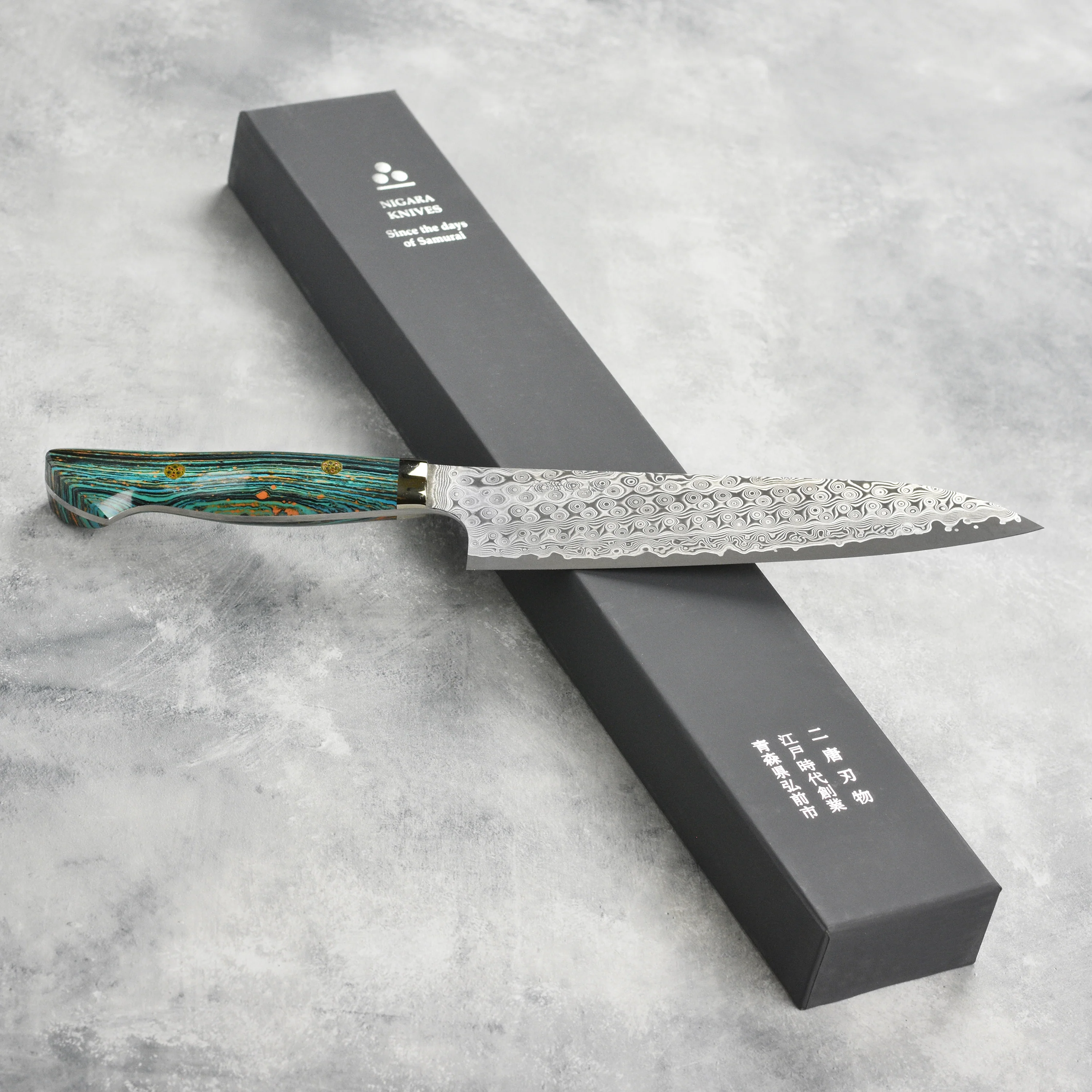 Nigara Anmon SG2 Damascus 8.25" Gyuto, Striped Turquoise - Image 4