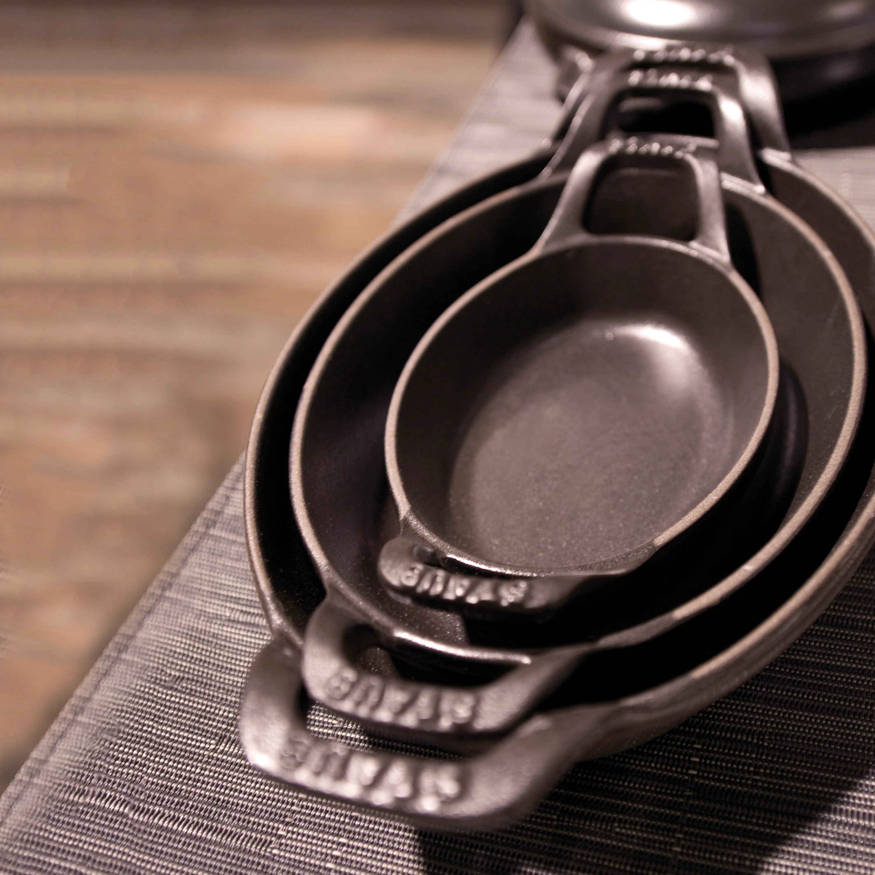 Staub Cast Iron 14.5" x 11.2" Matte Black Oval Au Gratin - Image 7