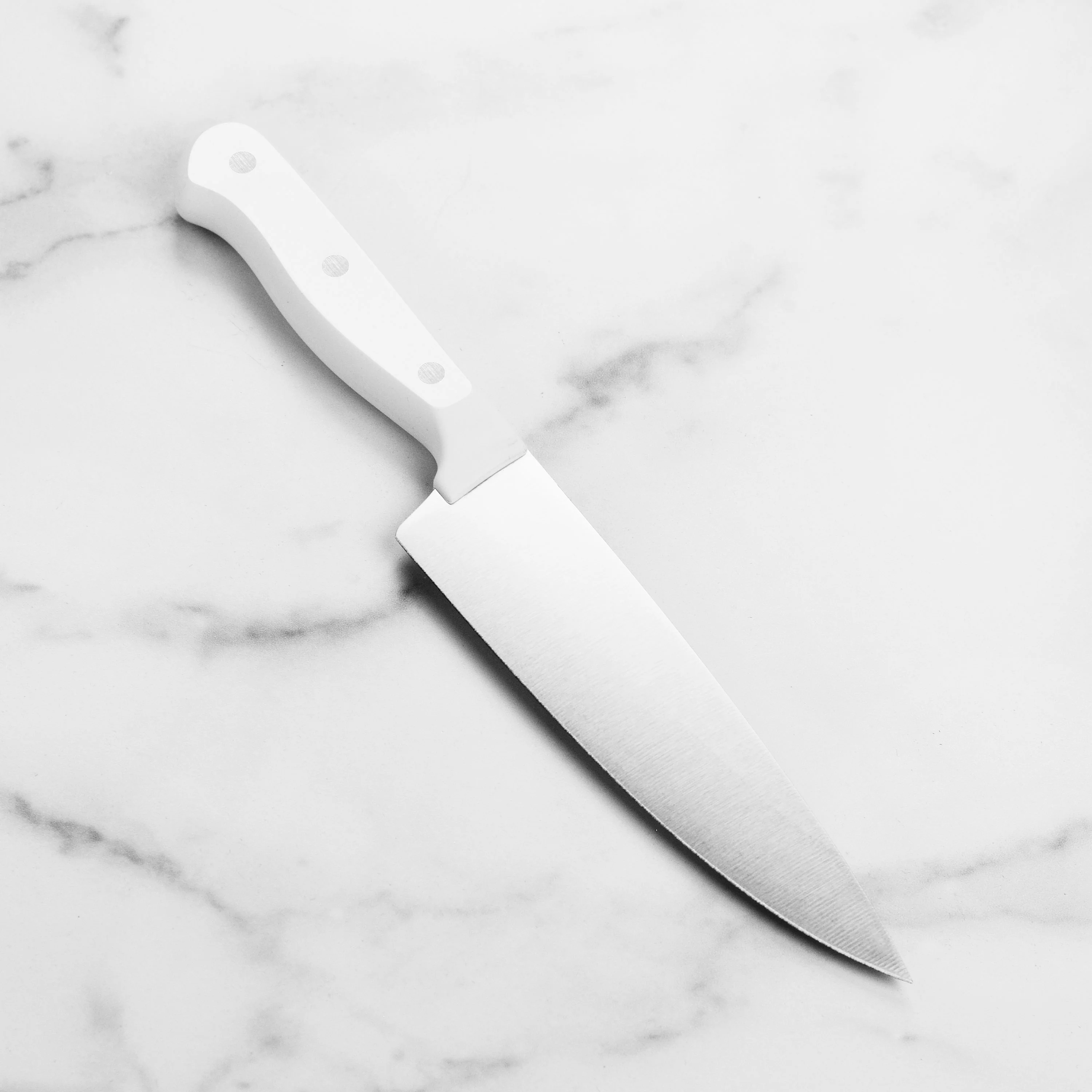 Wusthof Gourmet 6" Chef's Knife, White Handle - Image 6