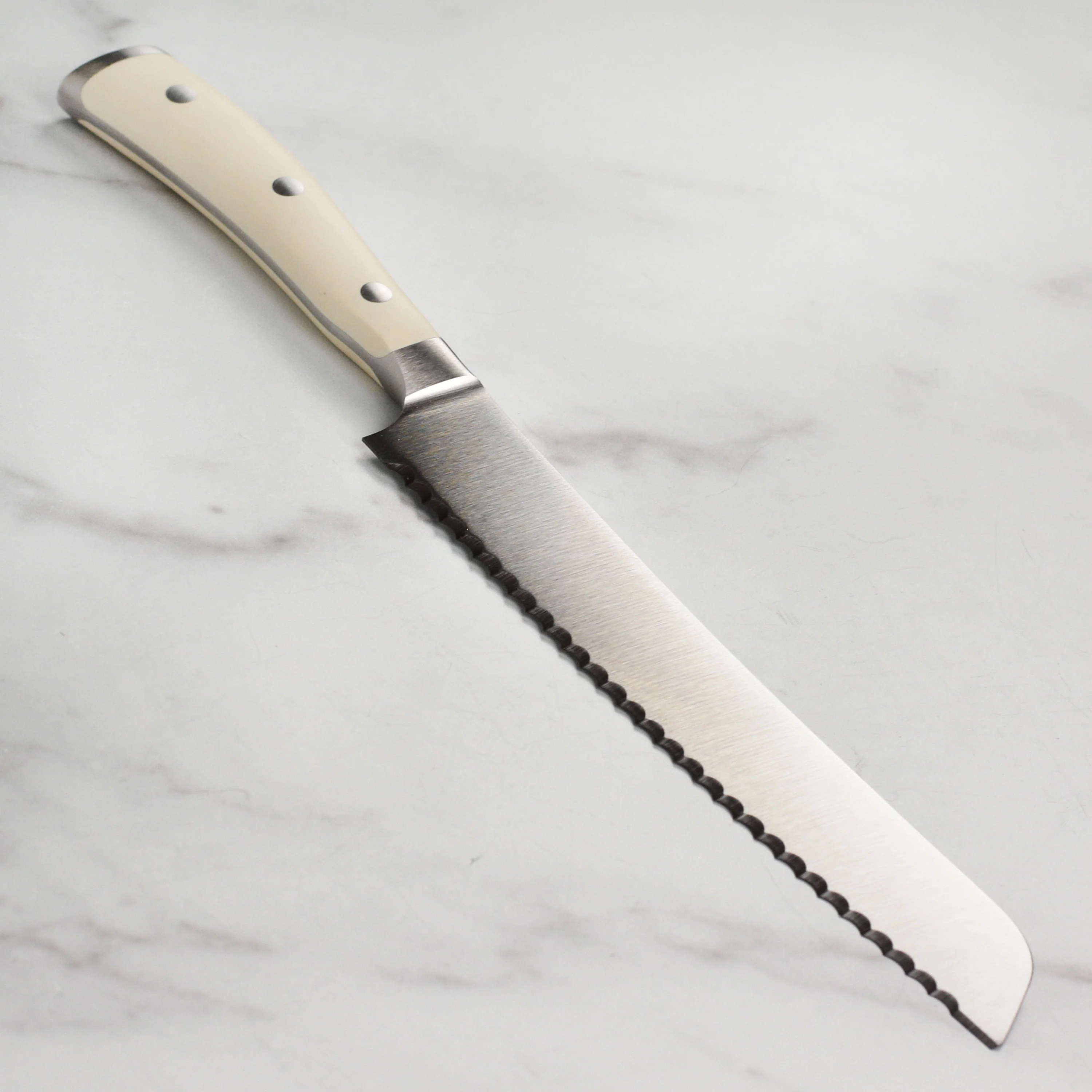 Wusthof Classic Ikon Creme 8" Bread Knife - Image 5