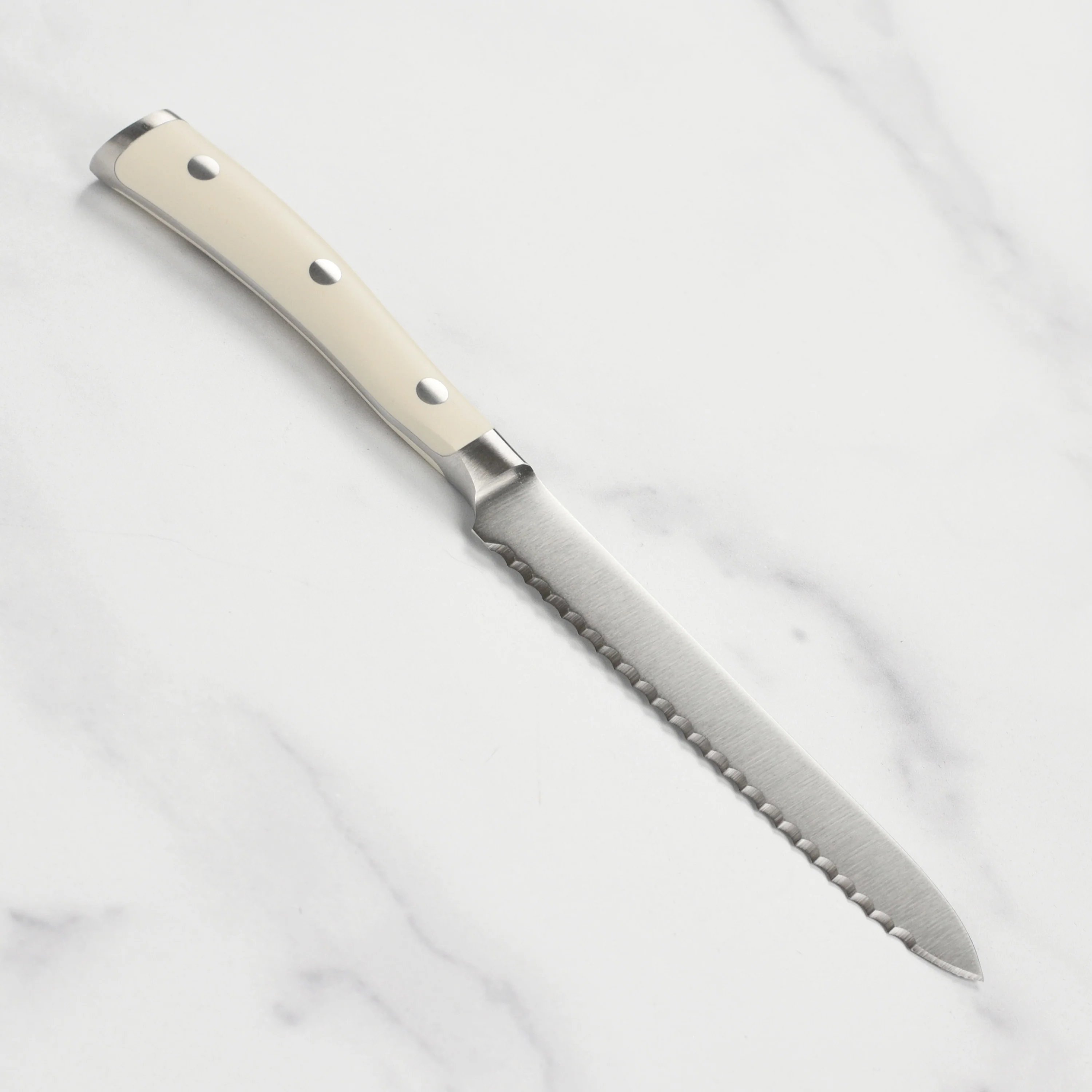 Wusthof Classic Ikon Creme 5" Serrated Utility Knife - Image 5
