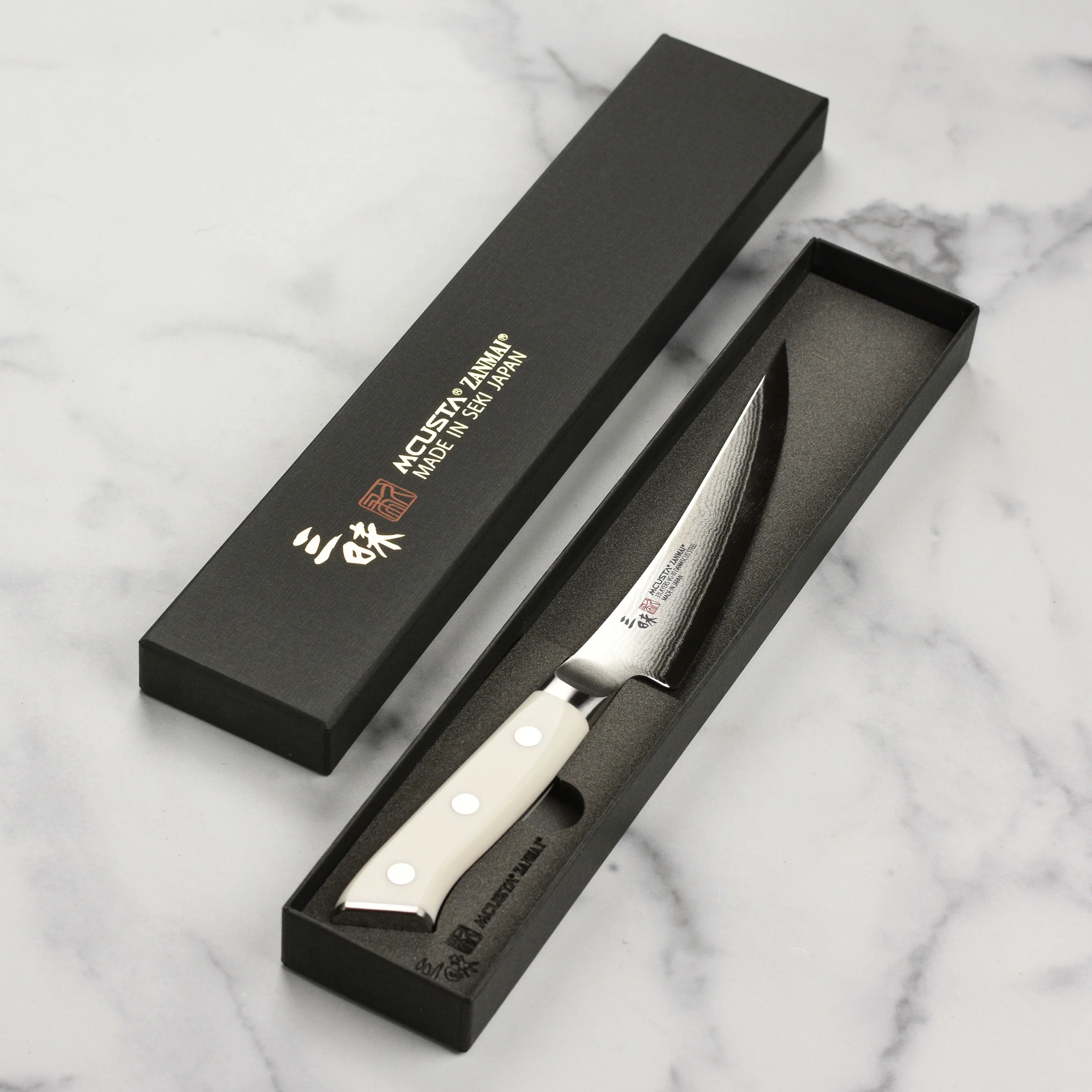 Zanmai Classic Damascus Corian 6.5" Curved Boning Knife - Image 6