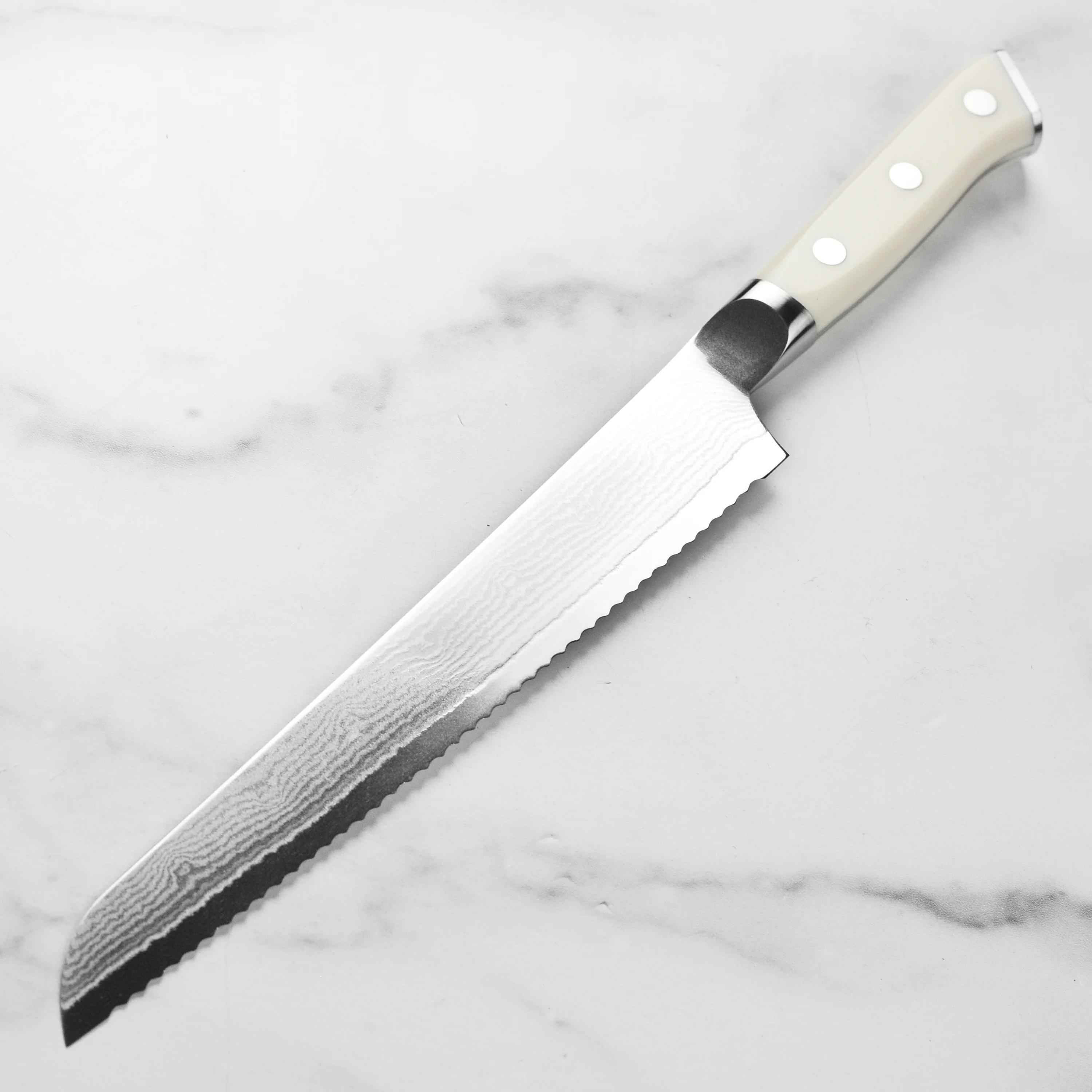 Zanmai Classic Damascus Corian 9" Bread Knife - Image 5