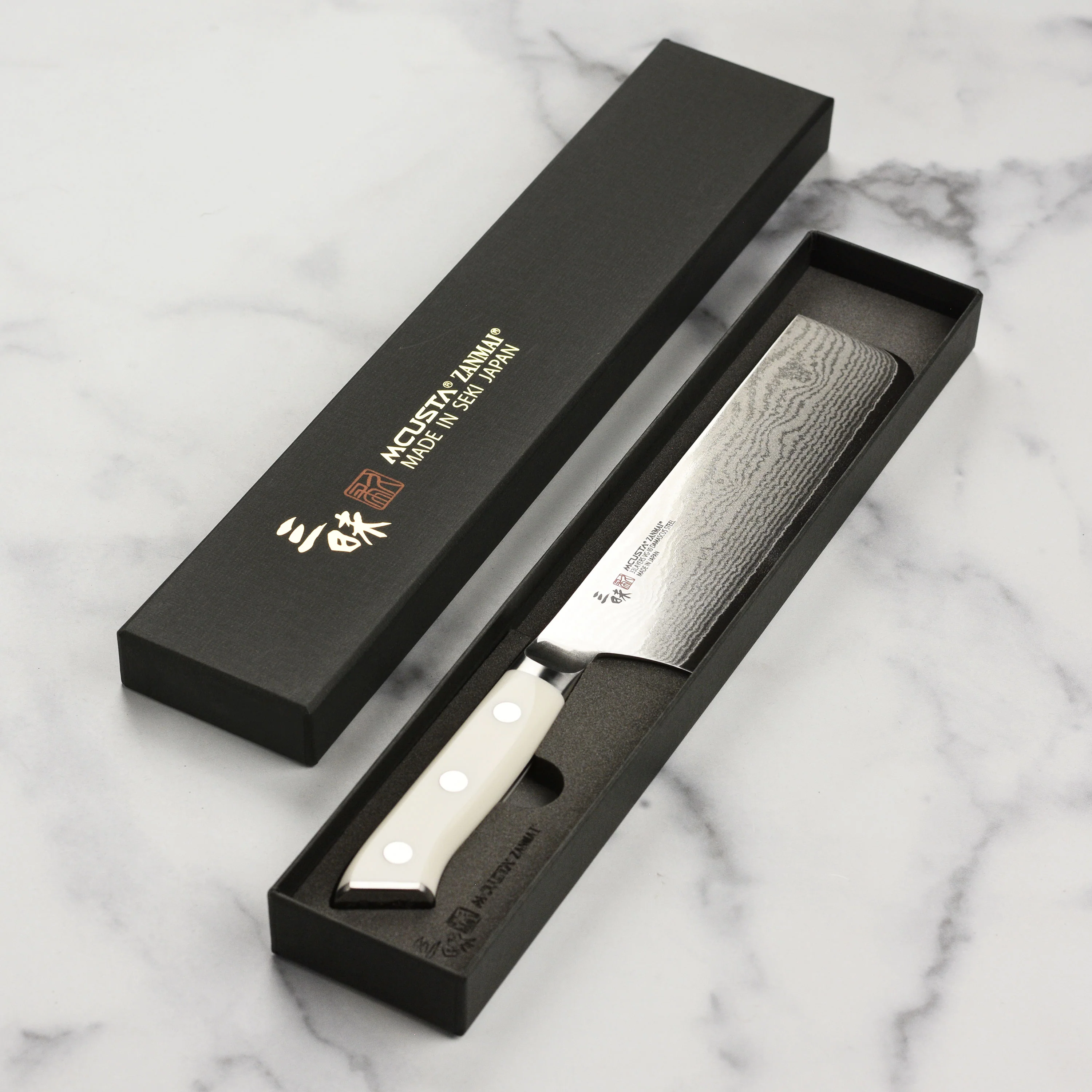 Zanmai Classic Damascus Corian 6.5" Nakiri - Image 6