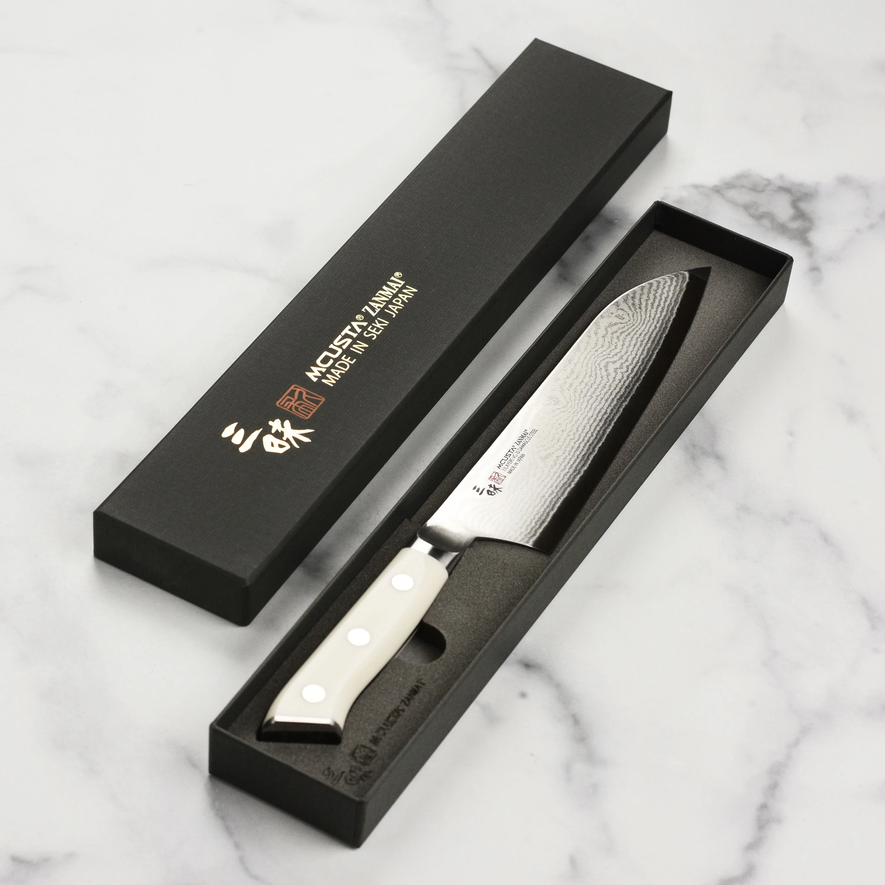 Zanmai Classic Damascus Corian 7" Santoku - Image 6