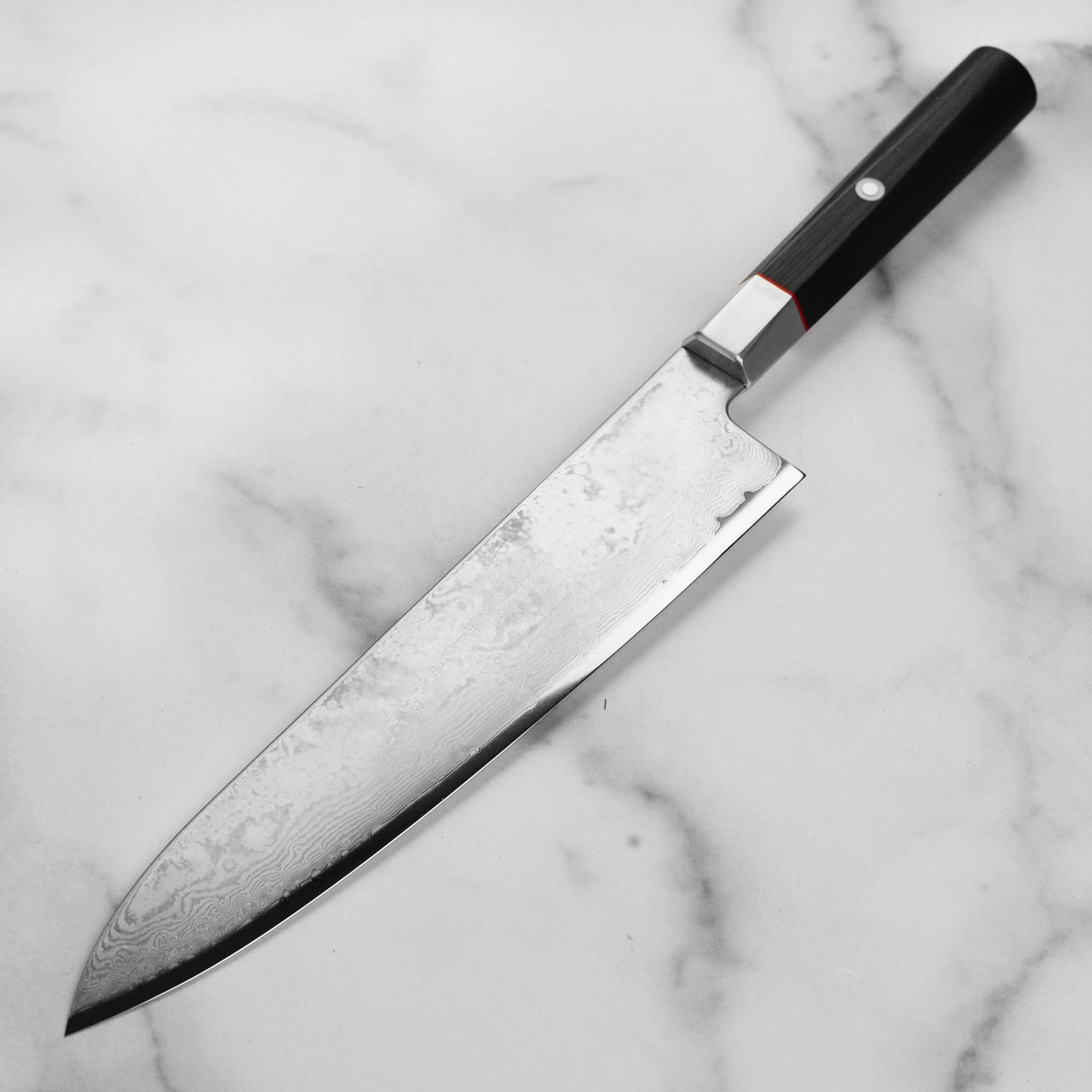 Zanmai Hybrid Damascus Splash 9.4" Gyuto - Image 5
