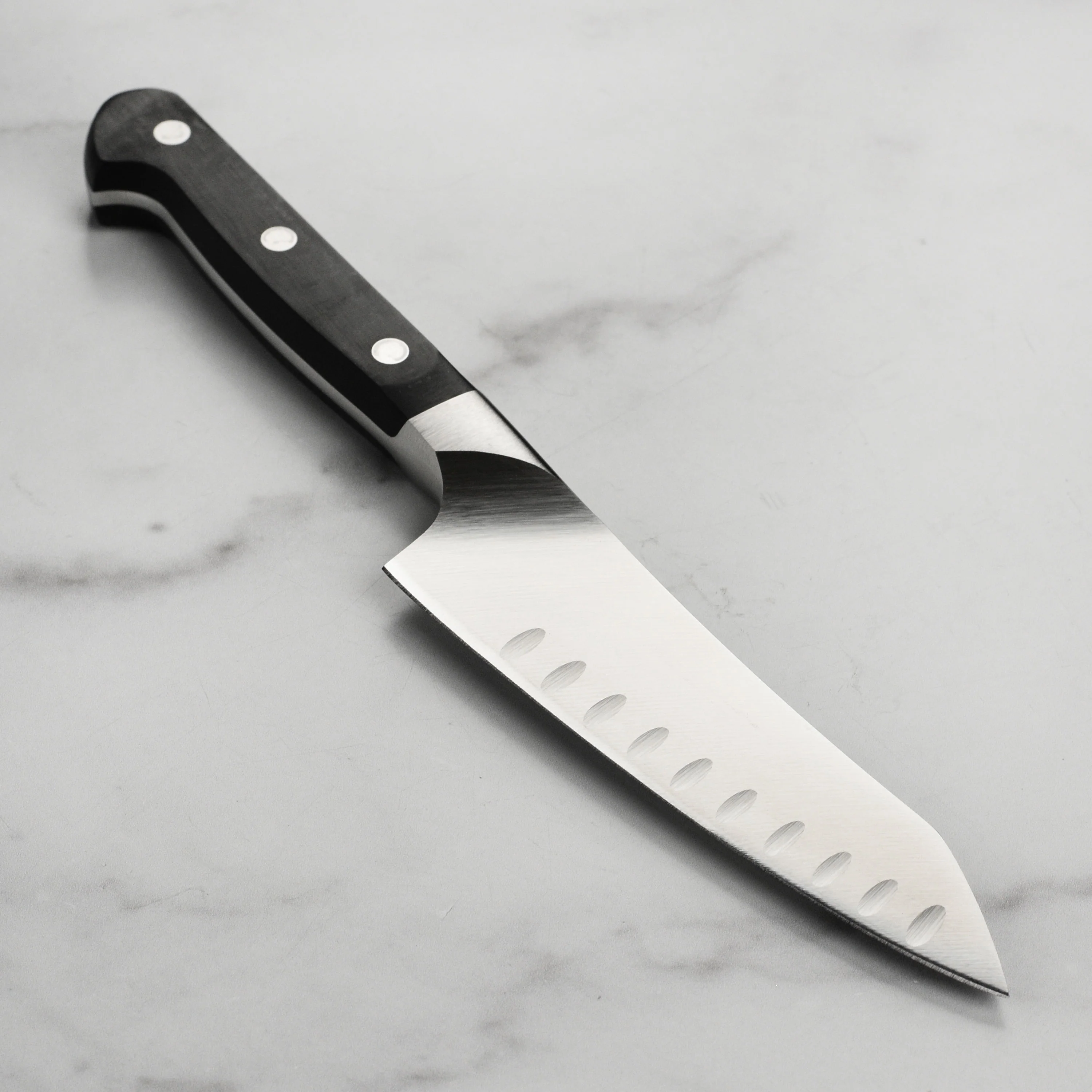 Zwilling Pro 5.5" Hollow Edge Rocking Santoku Knife - Image 5
