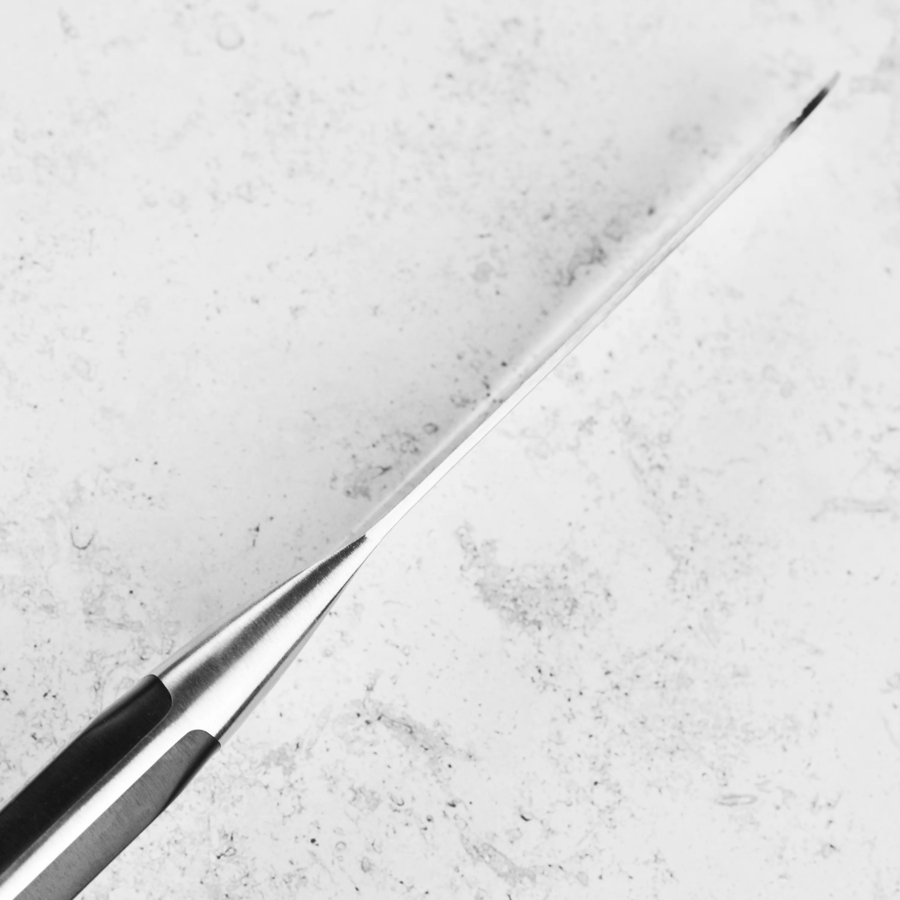 Zwilling Pro 5.5" Hollow Edge Wide Santoku Knife - Image 6